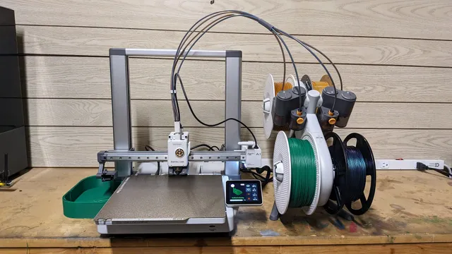 Bambu Lab A1 Combo 3D Printer sitting on a work bench.